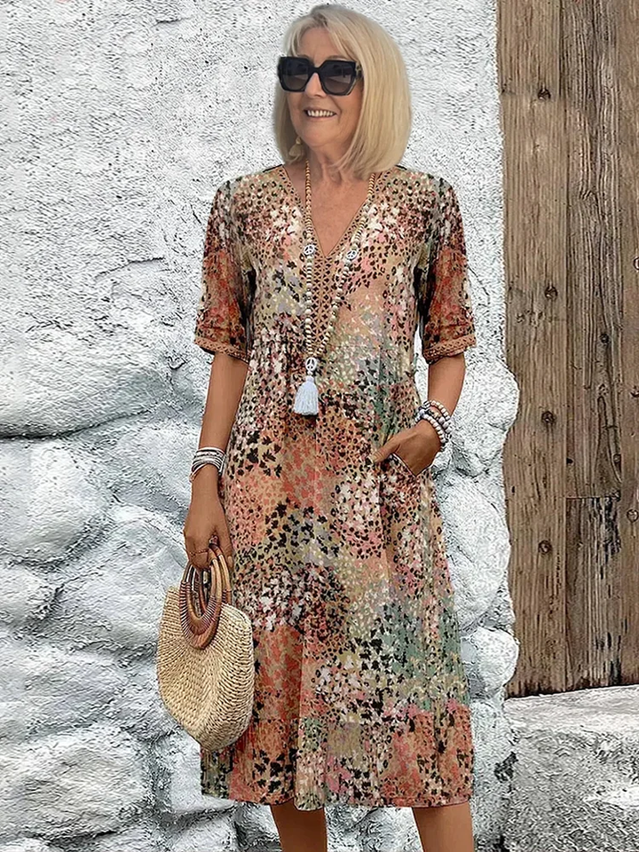 Clara | Lebendiges Kleid in mittlerer Länge